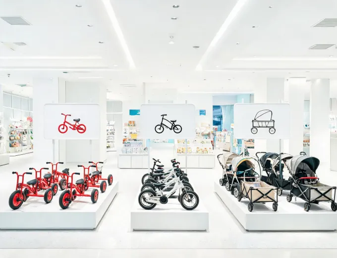 Retail display for Radio Flyer ride-on toys by age stage